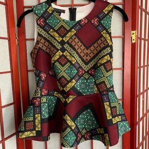 Geometric pattern peplum top